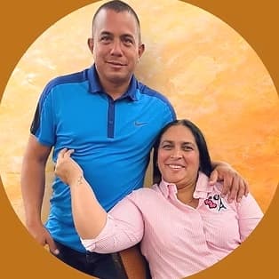Daniel and Katiuska, a smiling couple, side by side